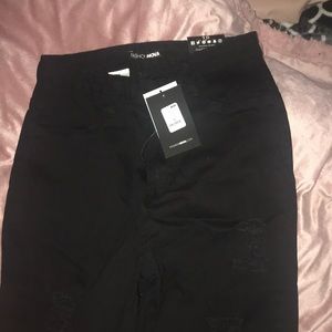 Black ripped skinny jeans